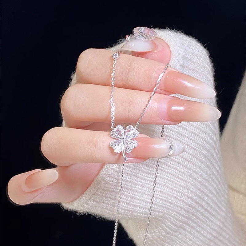 Teach sterling silver 999 exquisite zircon four-leaf clover necklace women's light luxury fashion high-end flower sterling silver collarbone chain